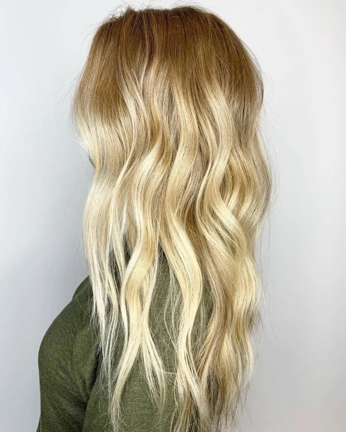 Long lived-in blonde waves from behind