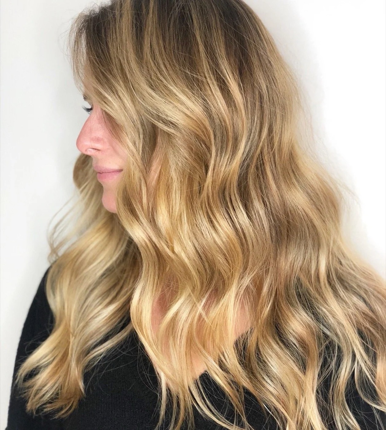 Soft, sunlit blonde with natural depth