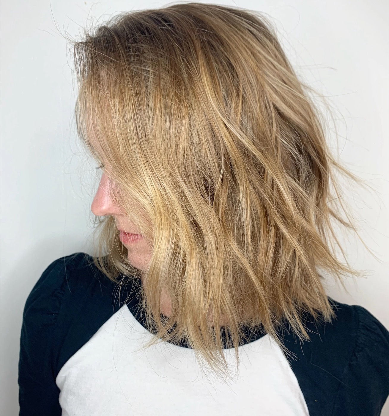 Shoulder-length honey blonde with dimension